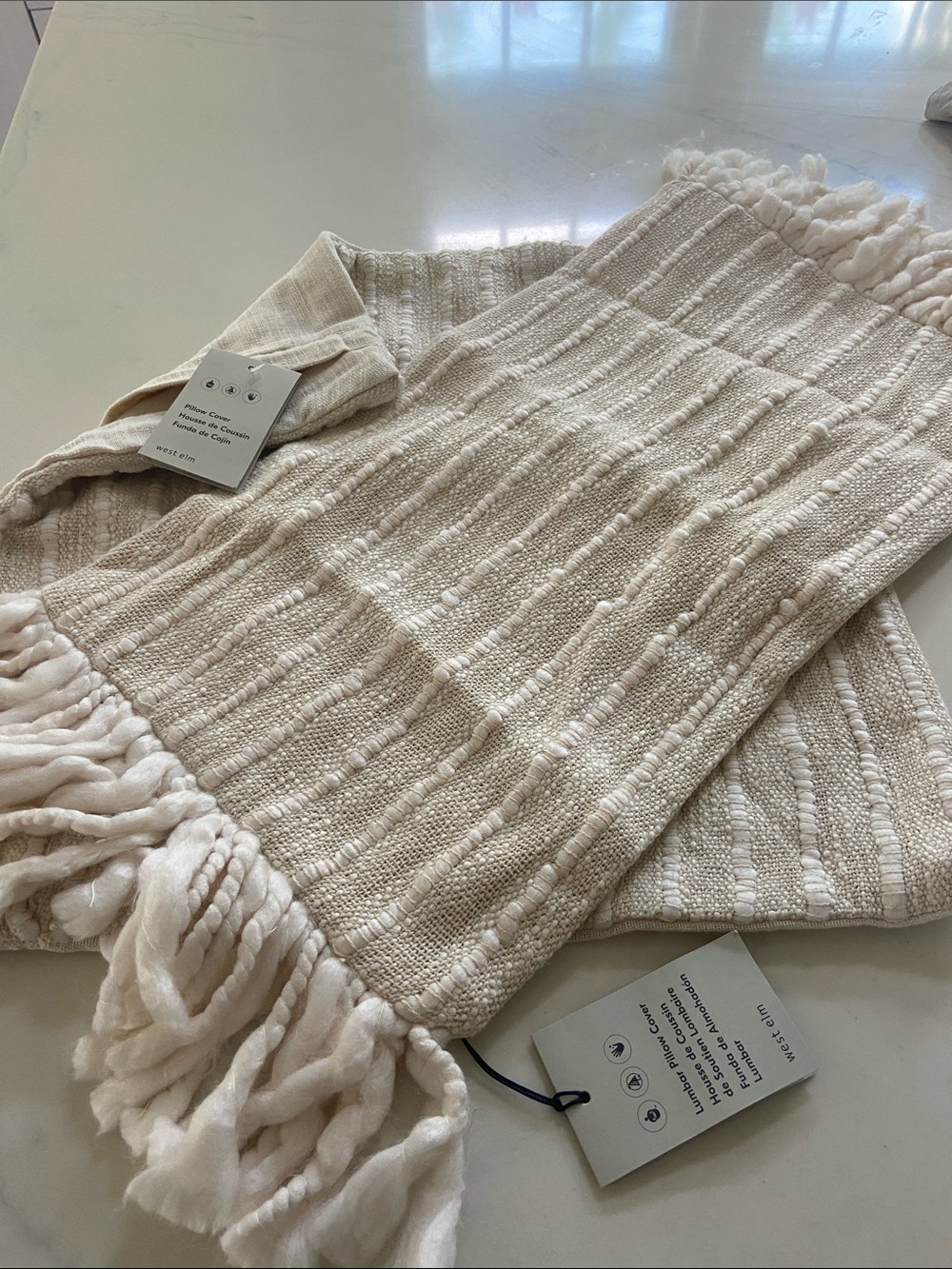 West Elm Cream Textured Woven Fringe pillow covers x2.. different but same